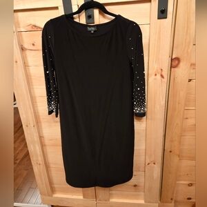 Elegant Black Dress with Embellished Sleeves
